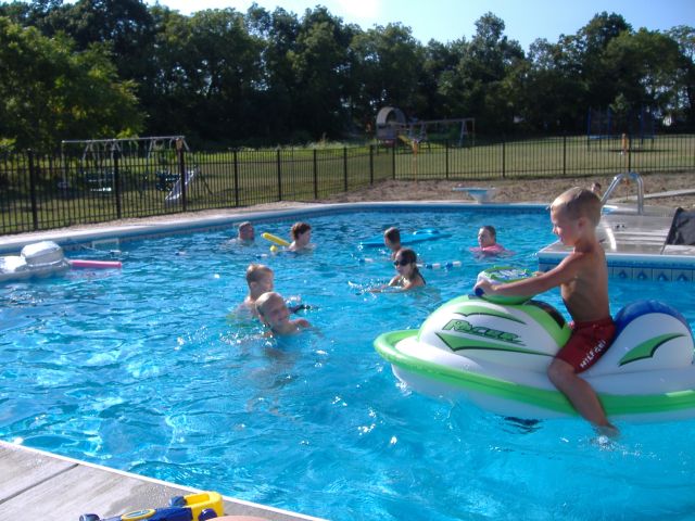 Matthew tries to run over everyone else in the pool.jpg